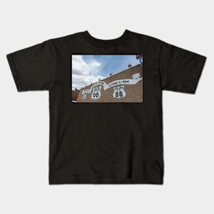 Route 66 signs on brick wall Kids T-Shirt